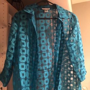 Sheer with a design over a camisole